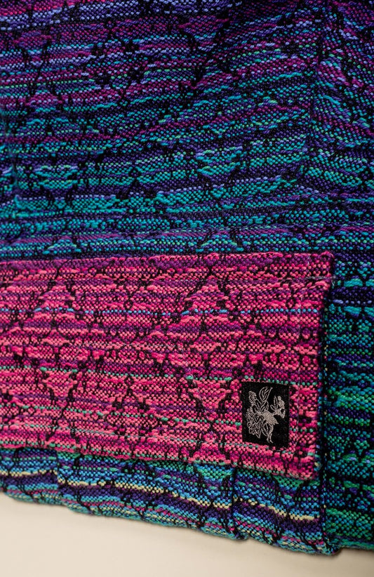 A closeup of the woven Signature Dreamer pattern.