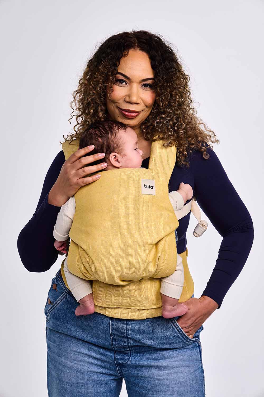 Mom and Baby in the Daffodil Linen Explore Baby Carrier