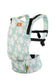 A forward-facing, ergonomic Free-to-Grow Carrier Unisaurus. Block shaped unicorns snuggle with their minis against a mint coloured background.