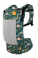 Free-to-Grow Carrier Coast Land Before Tula with a dinosaur print in emerald green and apricot. from Tula.