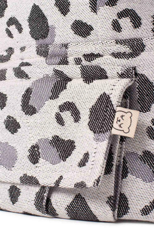 Snow Leopard - Porta-bebé para bebé em tecido com Signature
